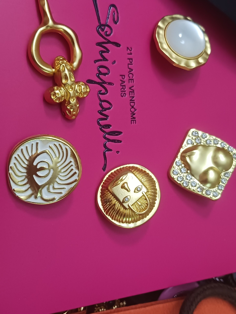 Schiaparelli Gold-Tone Button  Collection in Gold and White